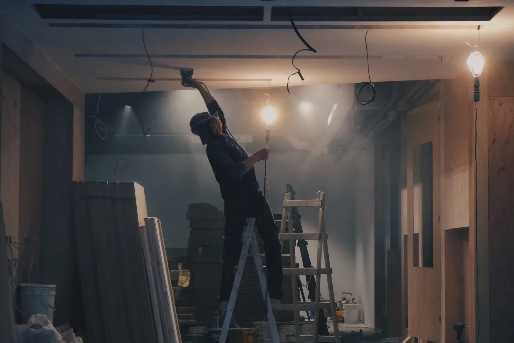 Construction worker on a ladder